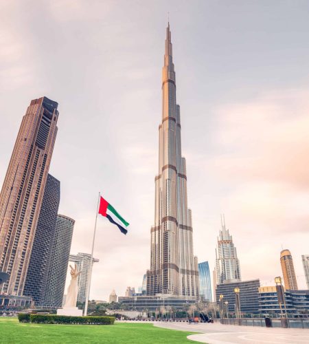 scenic-view-dubai-skyline-with-burj-khalifa-towering-all-other-buildings-motion-blur-flying-clouds-sightseeing-travel-destinations-arab-emirates-scaled.jpg